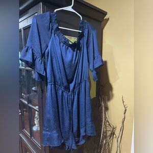 Women’s size Medium Navy Romper.  Skies are Blue Brand.  Boutique bought. EUC.